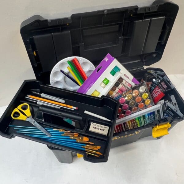 A toolbox full of art supplies and tools.